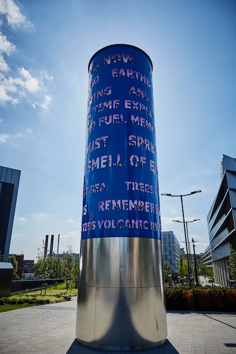Sculpture with revolving text